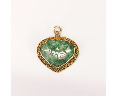 A Chinese gilt sterling silver and jade heart shape pendant, W. 2.5cm.