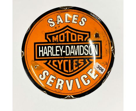 A Harley-Davidson enamelled iron advertising sign, Dia. 30cm.