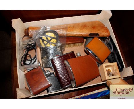 A box containing various collectables etc. to include hip flasks, AA badge, a vesta case, a lighter etc.