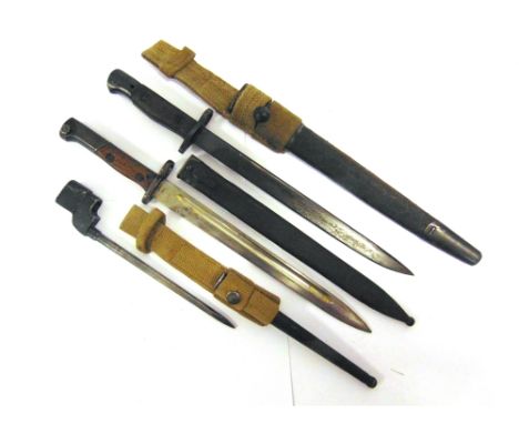 THREE BAYONETS  comprising a British 1907 Pattern sword bayonet, of Indian manufacture, the 12 inch (30.5cm) blade marked 'G.