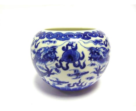 A CHINESE BLUE &amp; WHITE PORCELAIN BOWL  of globular form, decorated with two dragons chasing a flaming pearl, with a paint