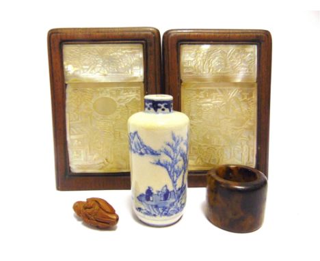 A CHINESE BLUE &amp; WHITE PORCELAIN SCENT BOTTLE 19th century, painted with figures on a promontory in a mountain landscape,
