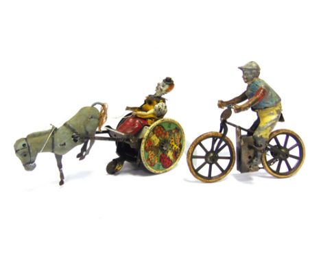 TWO TINPLATE TOYS  comprising a Lehmann Balky Mule (Stubborn Donkey), with a clockwork motor (requiring attention), 18.5cm lo