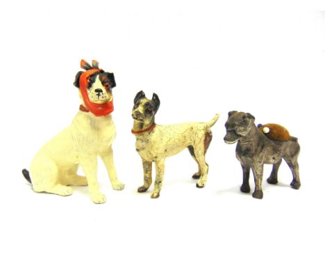 THREE WHITE METAL TERRIERS  late 19th / early 20th century, comprising a cold painted seated terrier, modelled with a bandage