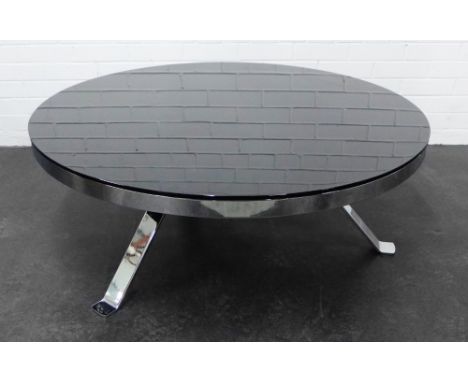 Stylish contemporary coffee table with black glass circular top on a chromed metal base, 42 x 100cm 