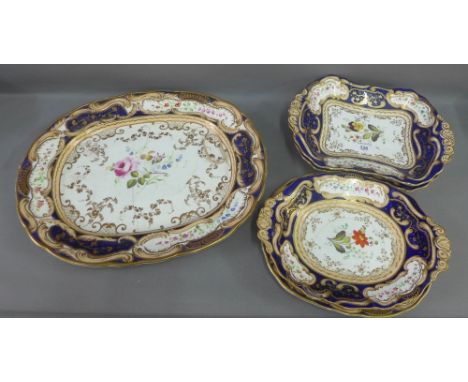 Quantity of 19th century English porcelain table wares painted with mixed floral sprays with blue rims and gilt edge borders 