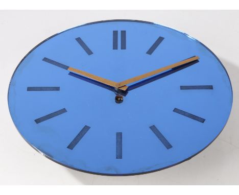 A mid century wall clock, the blue mirrored dial with baton markers and a Garrod movement, 30cm diameter.