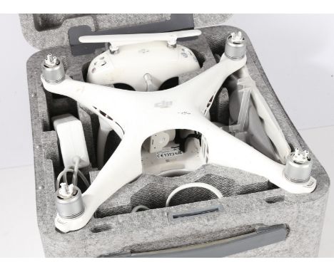 DJI Phantom 4 Drone with fitted carrying case, controller, charger, manual, etc. (damaged, untested).