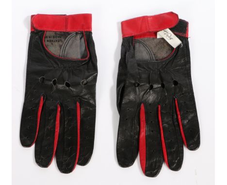 A pair of 1960's Graham Hill leather driving gloves, the red and black leather gloves with velcro straps, with fabric tag