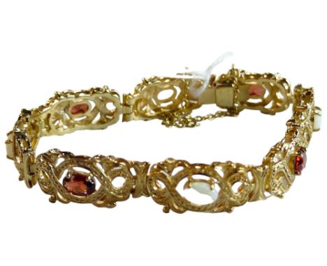 9 CARAT GOLD GARNET AND OPAL BRACELET 17.33G 