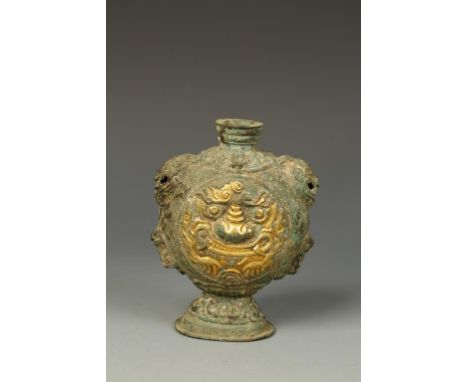 A TIBETAN COPPER FLASK, with mask decoration, 18th/19thC, 5.5" high