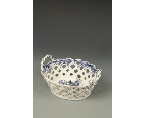 A WORCESTER BLUE AND WHITE PORCELAIN OVAL BASKET, 'Pinecone' pattern with twisted handles and applied flowerhead decoration o