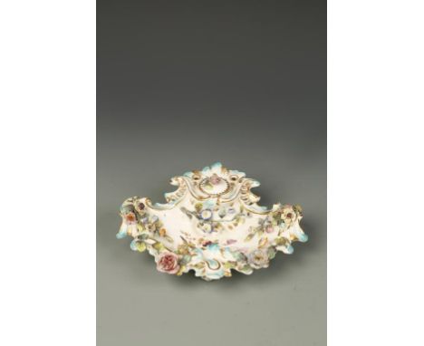 A COLEBROOKDALE PORCELAIN INKWELL, floral encrusted with painted flower decoration, in a moulded and pierced Rococo border 'C