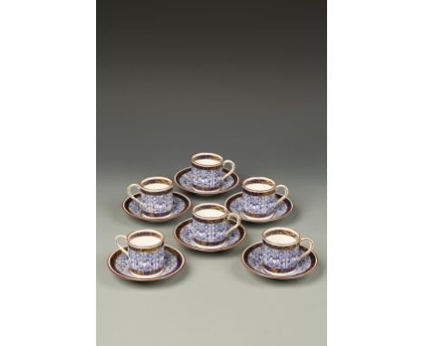 A SET OF SIX ROYAL WORCESTER PORCELAIN COFFEE CANS AND SAUCERS, Royal Lily pattern in blue, printed marks on underside circa 