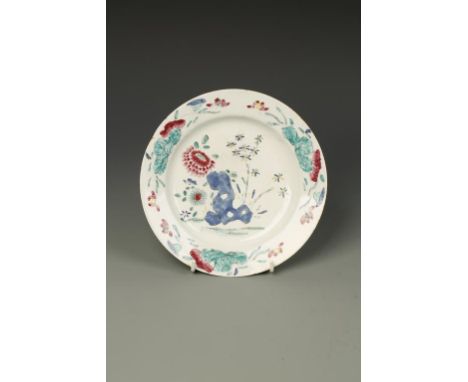 A BOW PORCELAIN PLATE, with famille rose style flower and rock work decoration, c.1755, 7.75" dia.