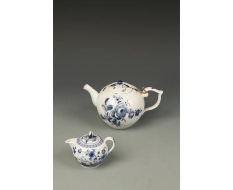 A MEISSEN BLUE AND WHITE PORCELAIN TEAPOT, with floral decoration, 18th century, 3.75" high, and a miniature blue and white p