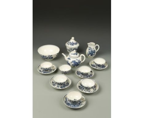 A WORCESTER BLUE AND WHITE PORCELAIN TEA SET in the 'Three Flower' pattern. Comprising teapot, sugar bowl, milk jug, pap bowl