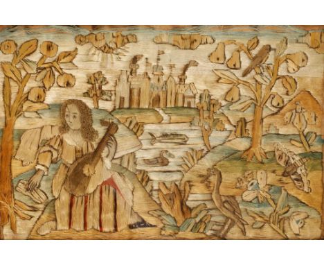 A SILK WORK PICTURE of a figure playing a lute with a 'Nonesuch' type palace to the distance, surrounded by trees and animals