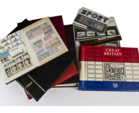 A collection of World stamps, including one stock book dedicated to railway stamps, two George VI and later stockbooks with c