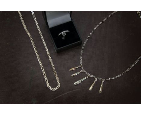 Eight modern items of silver and white metal jewellery, including four necklaces, a bangle, a ring, two bracelets, with 7 box