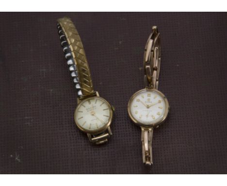 Two vintage ladies wristwatches, including a 9ct gold Cyma on expanding strap, a gilt Baume Bimatic (2) 