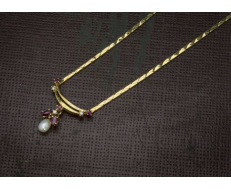 A 1980s 9ct gold and gem set necklace, flattened link centred with a pearl and red and clear stones, clasp damaged, 9.8g (3) 
