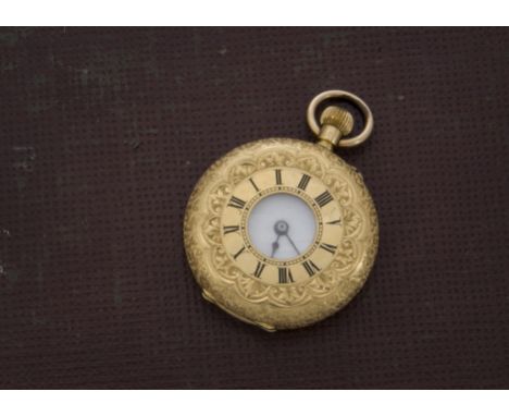 An early 20th century continental 18ct gold half hunter lady's pocket watch, ornately engraved outer cased, with black enamel