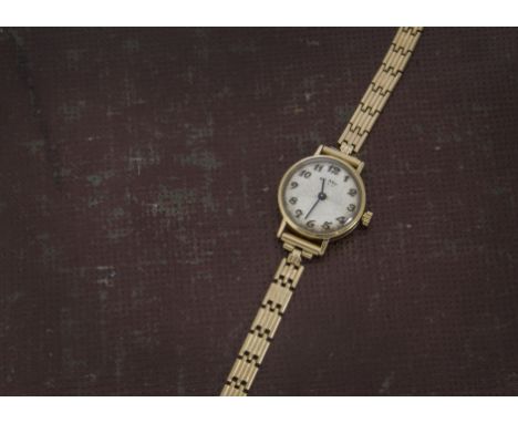 A 1960s 9ct gold Rotary lady's wristwatch, circular case on 9ct gold bracelet, 13.5g 