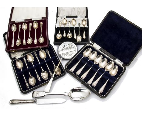 A collection of silver and silver plate, including four sets of six silver teaspoons and coffee spoons in cases, various othe