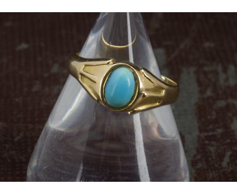 A Victorian 18ct gold and turquoise solitaire signet ring, 5.9g and size R 