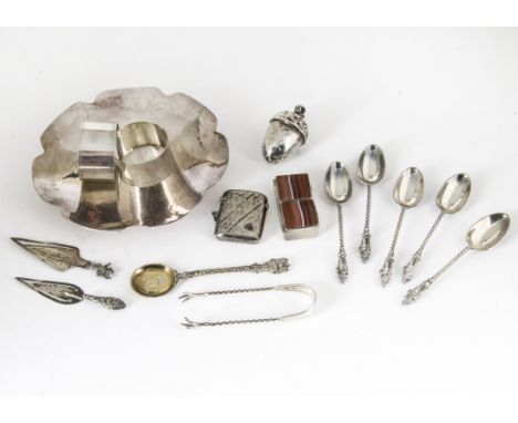A 1960s silver dish by PE, together with five silver teaspoons and tongs, pair of silver napkin rings, acorn shaped silver ra