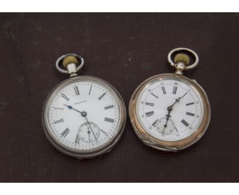 Two vintage silver open faced pocket watches, one a Waltham, the other continental heightened with gold plating (2) 