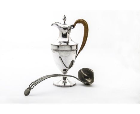 A Victorian Sheffield plate hot water jug, in the neo-classical taste, together with an Art Nouveau pewter ladle (2) 