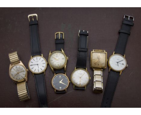 A group of seven vintage and modern gentlemens wristwatches, including one marked Raymond Weil, a Yema, an Enicar, a Pilot, a