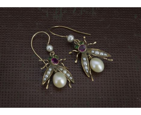 A pair of vintage gold and gem set earrings, modelled as bees with pearl abdomen and wings with red stone body and green eyes