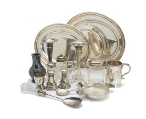 A collection of silver and silver plated items, including a silver Christening tankard, pair of peppers, egg cup, napkin ring