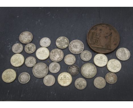 A collection of coins, including an 1887 florin, VF-EF, a 1944 Canada 50 cents, F-VF, some pre-1946 coinage, and more, severa