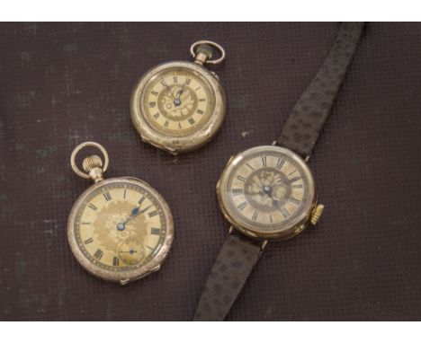 A group of three late 19th and early 20th century gold ladies pocket watches, one marked 14k with gilt dust cover and now con
