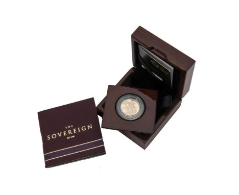 An Elizabeth II full sovereign, dated 2015, Unc, in plastic capsule and in Royal Mint wooden box with certificate and outer c