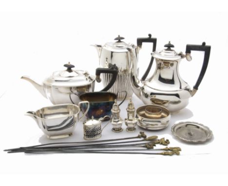 A collection of silver and silver plated items, including a silver wine bottle coaster, a pair of peppers, a mustard and a na