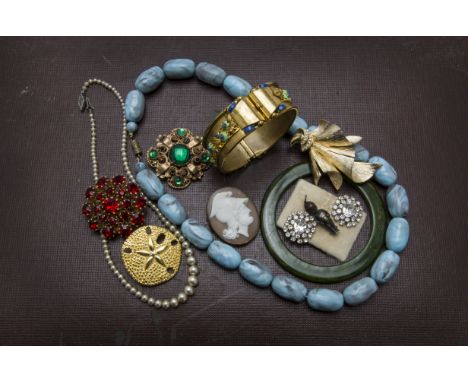A collection of jewellery, including a cameo brooch with Greek god bust, a gilt bangle with enamel and various other costume 