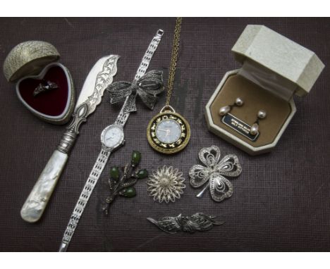 A collection of jewellery and other items, including a silver bangle, several silver items of jewellery, a silver and mop but