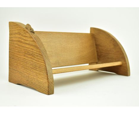 Workshop of Robert 'Mouseman' Thompson of Kilburn - A 20th century oak book trough of typical form with carved mouse running 