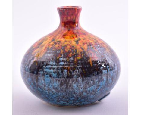 Poole Pottery - a vintage late 20th century ceramic bud vase. The vase in hues of reds, ochres &amp; blues. A limited edition