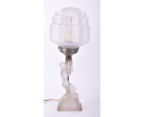 A 1930s Art Deco frosted glass table lamp light. Frosted glass base in the form of a maiden having chrome angular upright to 