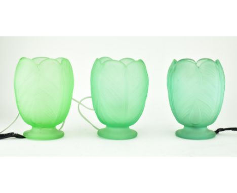 Three early 20th century 1930s Art Deco green frosted glass light lamps. Each lamp in the form of a tulip flower. Sold as unt