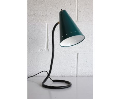 A retro 20th century 1950s French designer desk / table lamp light. The lamp having a conical dark green shade with perforate