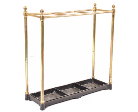 A Victorian 19th century brass &amp; painted metal umbrella stick stand. The stand having a three section brass tubular struc