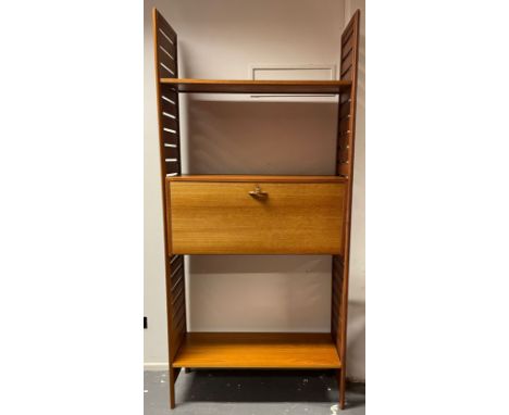 Staples - Ladderax - A retro 1970s teak single bay wall shelving unit. The bookcase comprising of two teak uprights supportin