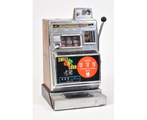 Aristocrat Nevada - A vintage 20th century 1960s one arm bandit slot machine. The fruit / games machine having a chromed meta